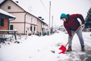 How to Stay Safe When Shoveling Snow from Your Property